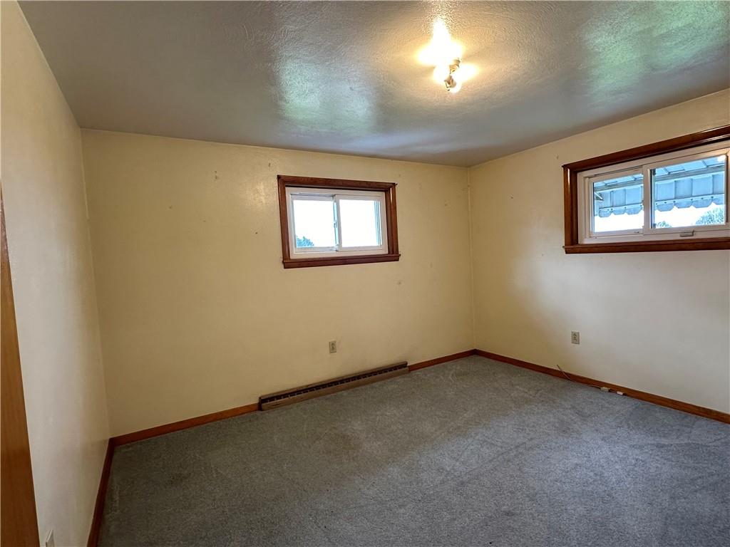 102 Schall Road Kittanning, PA 16201 - Photo 12 of 30 an empty room with windows