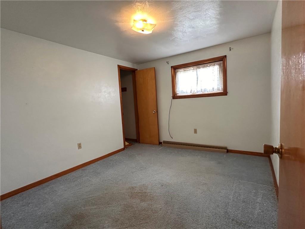 102 Schall Road Kittanning, PA 16201 - Photo 13 of 30 an empty room with windows