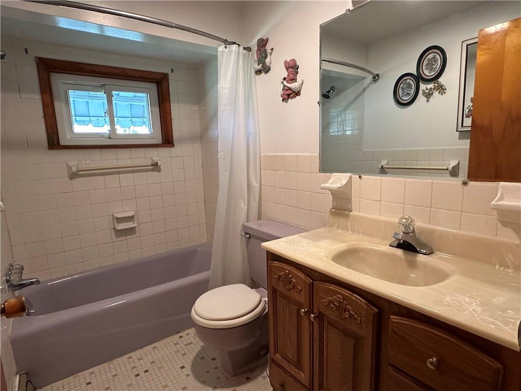 102 Schall Road Kittanning, PA 16201 - Photo 14 of 30 a bathroom with a sink a toilet and shower