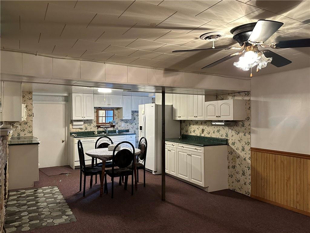 102 Schall Road Kittanning, PA 16201 - Photo 15 of 30 a view of a dining room with furniture and chandelier