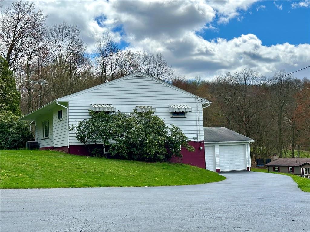 102 Schall Road Kittanning, PA 16201 - Photo 2 of 30 a front view of a house with a yard