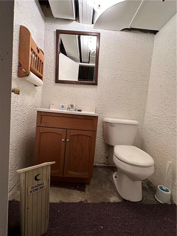 102 Schall Road Kittanning, PA 16201 - Photo 23 of 30 a bathroom with a toilet sink and mirror