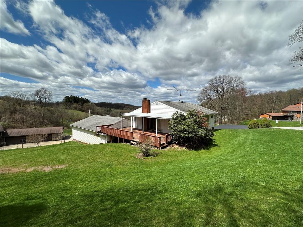 102 Schall Road Kittanning, PA 16201 - Photo 3 of 30 a view of a garden with a house in the background