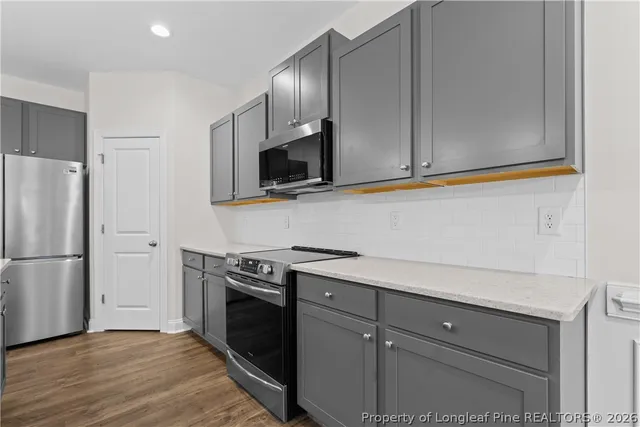 a bathroom with a sink a toilet and a bathtub