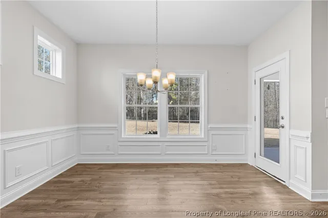 a kitchen with a sink stainless steel appliances and cabinets