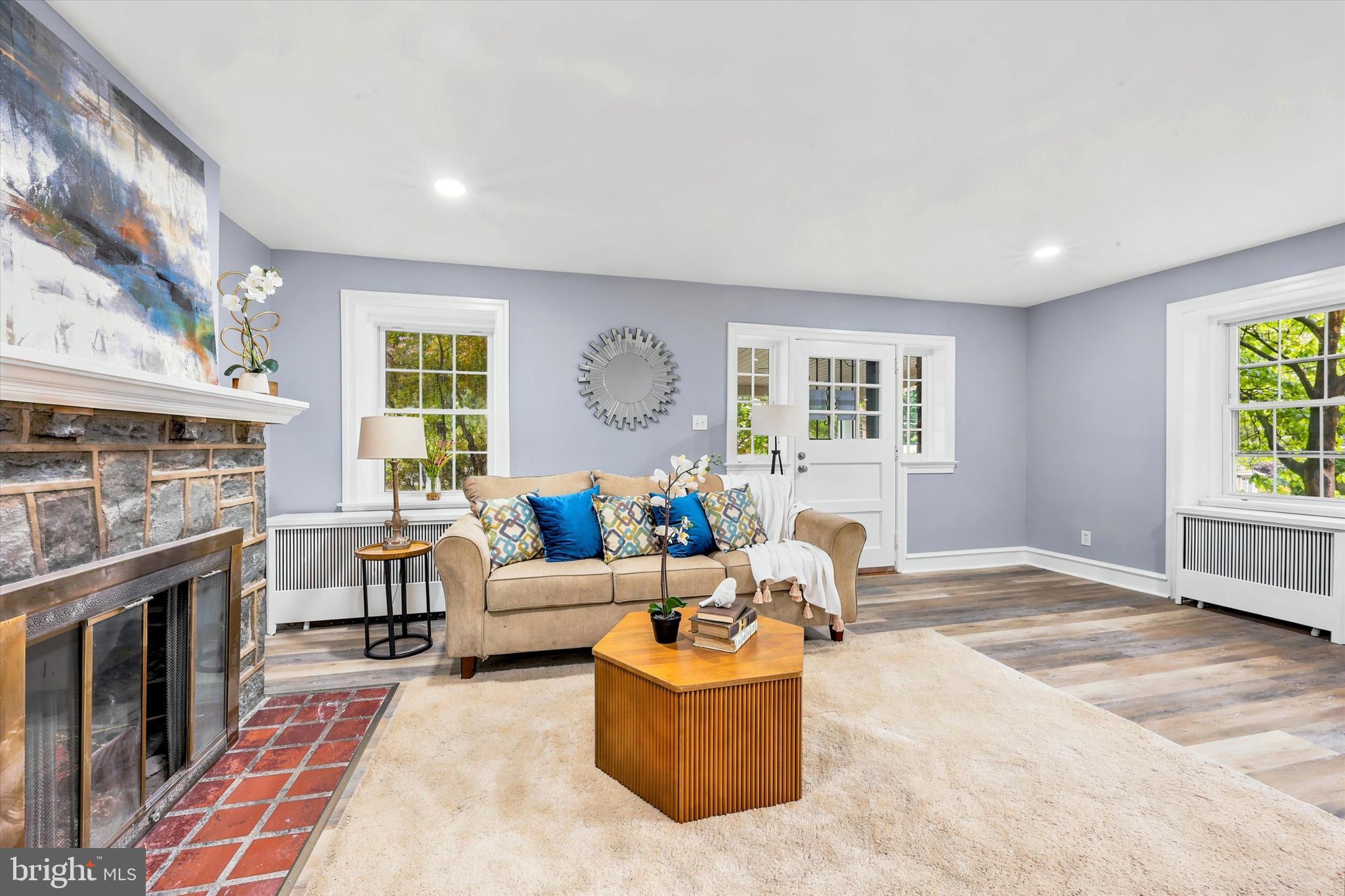 7208 Hilltop Road Upper Darby, PA 19082 - Photo 8 of 28 a living room with furniture and a fireplace