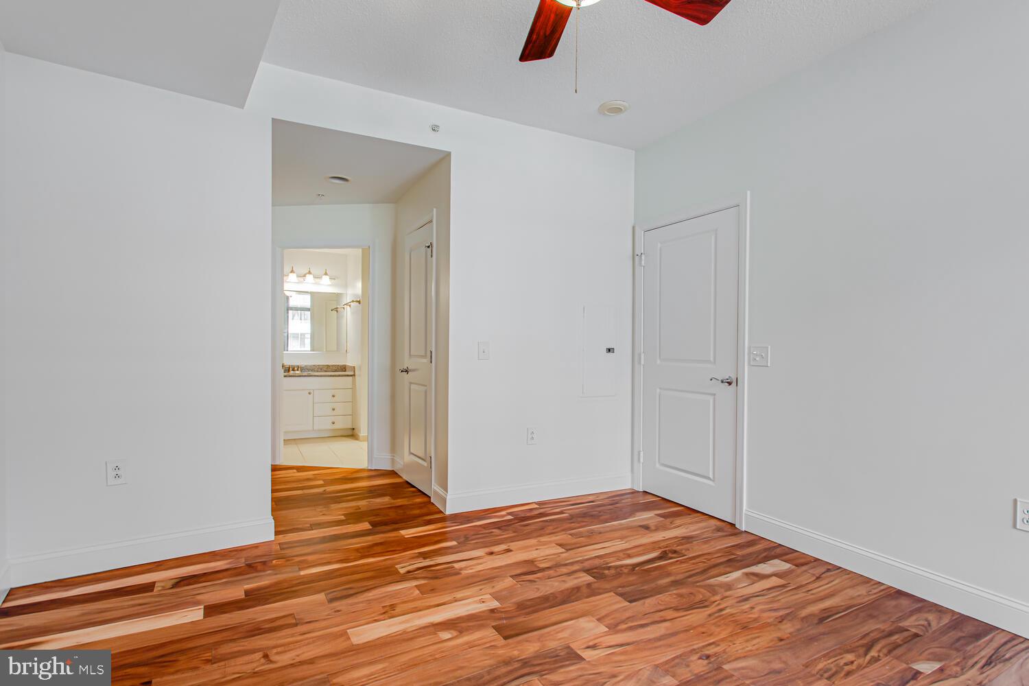 3650 South Glebe Road, Unit 239 Arlington, VA 22202 - Photo 21 of 38 a view of a livingroom with wooden floor and closet
