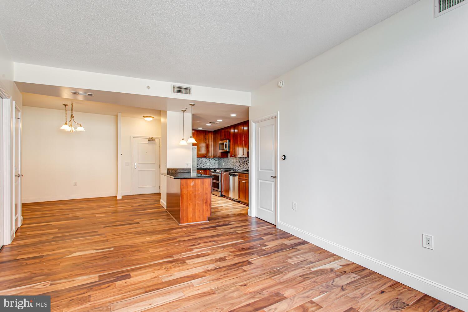 3650 South Glebe Road, Unit 239 Arlington, VA 22202 - Photo 5 of 38 a view of a kitchen from the hallway