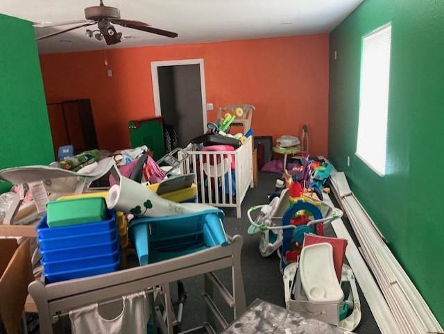 2434 South 9th Street Waco, TX 76706 - Photo 11 of 16 a bedroom with furniture and a wooden floor