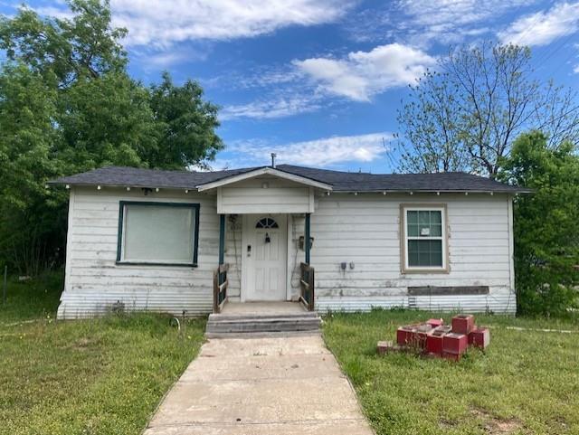 2434 South 9th Street Waco, TX 76706 - Photo 2 of 16 a front view of a house with a yard