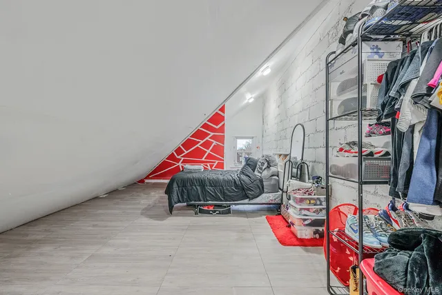 an outdoor space with lots of stuff and umbrellas