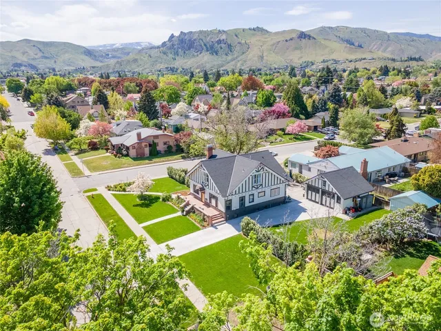an aerial view of a house with a garden