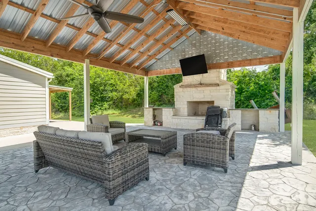 a outdoor space with patio the couches and pool