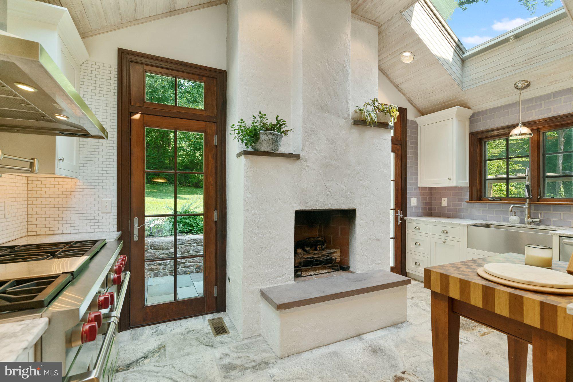 5750 Lower Mountain Road New Hope, PA 18938 - Photo 16 of 59 Gas fireplace & 2 French doors to rear patio