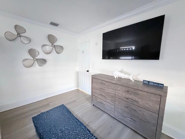 91 Treasure Boulevard Key Largo, FL 33037 - Photo 13 of 20 a living room with furniture and a flat screen tv