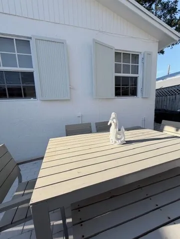 a view of a backyard of the house