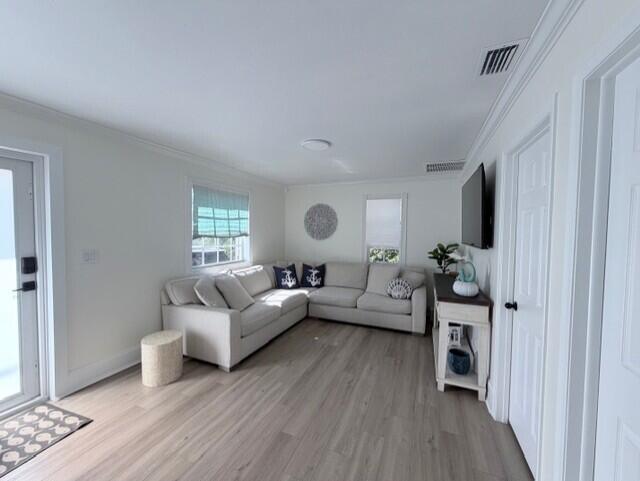 91 Treasure Boulevard Key Largo, FL 33037 - Photo 2 of 20 a living room with furniture window and wooden floor