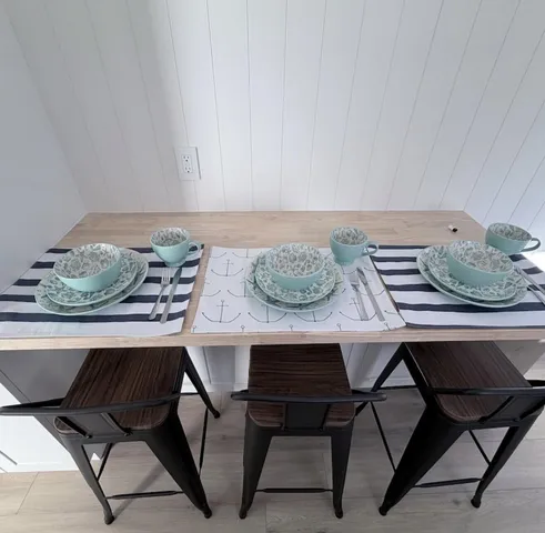 a kitchen with a sink stove and refrigerator