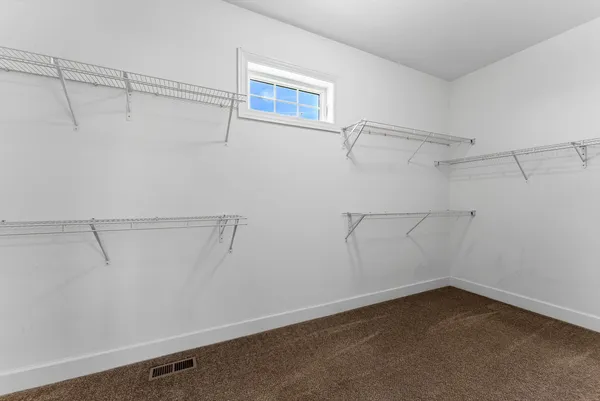 a view of a room with racks on the wall