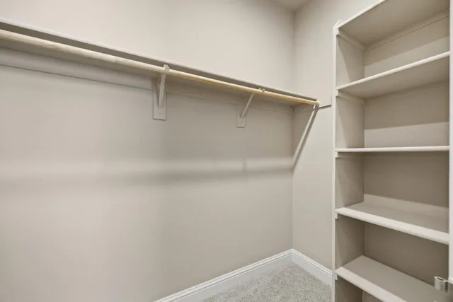 a view of a room with racks on the wall