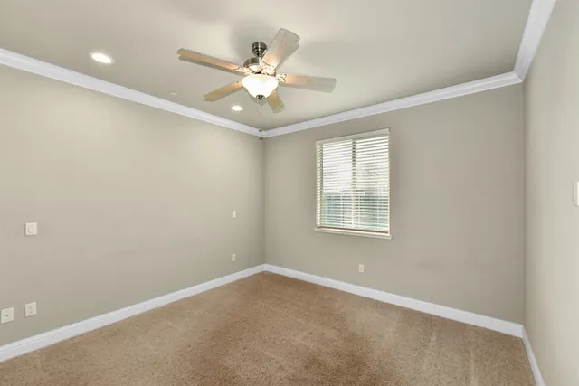 an aerial view of a house with a outdoor space