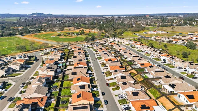 an aerial view of a house with a outdoor space