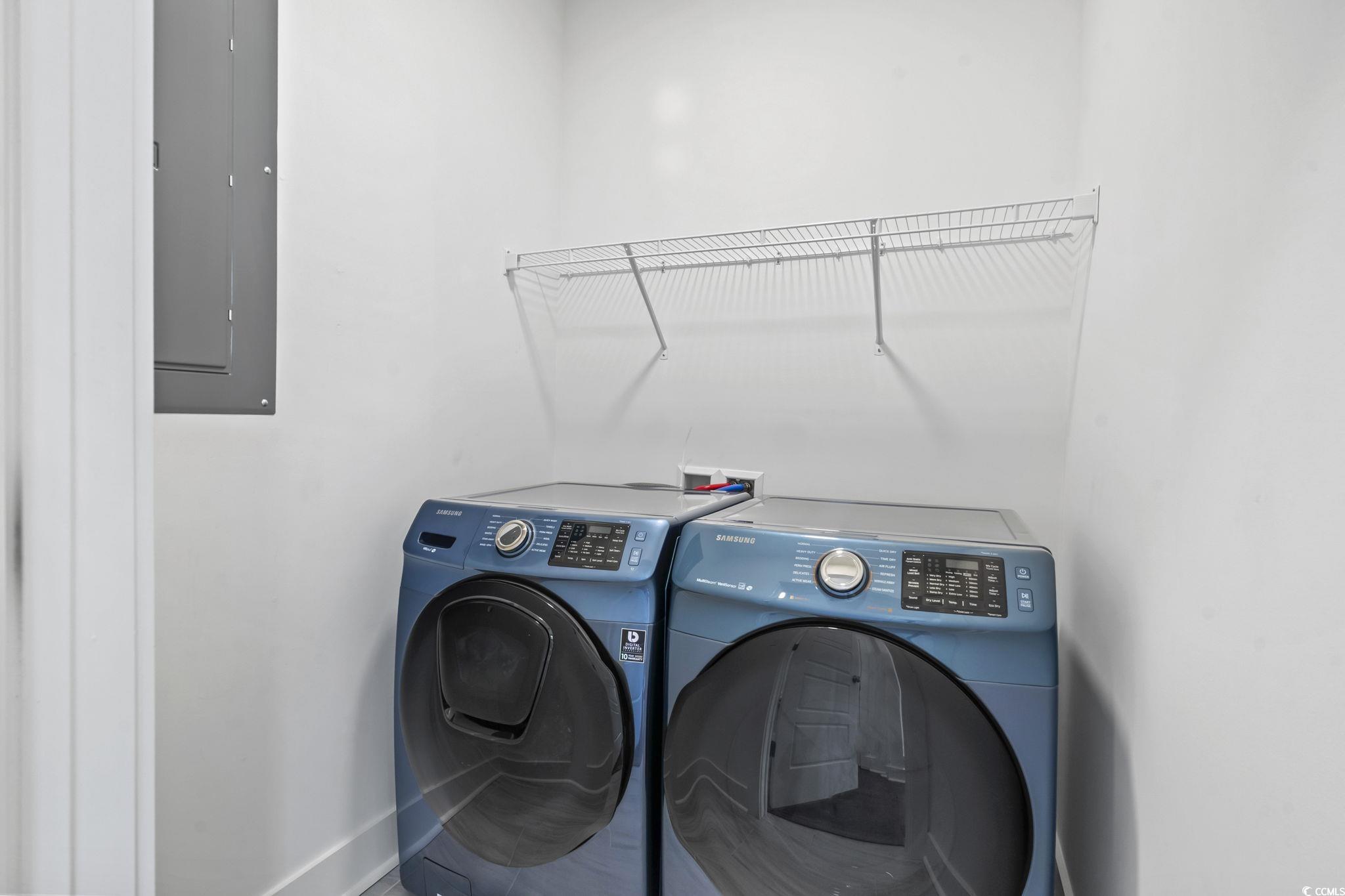 1524 Sayebrook Parkway Myrtle Beach, SC 29588 - Photo 17 of 40 Laundry area with electric panel and washing machine and clothes dryer