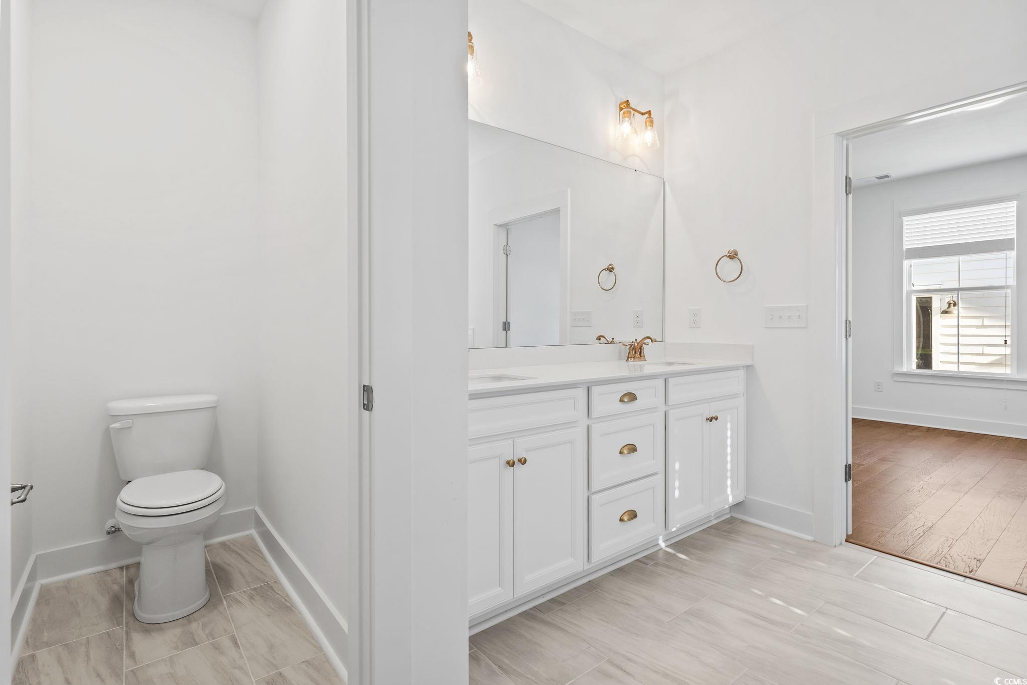 1524 Sayebrook Parkway Myrtle Beach, SC 29588 - Photo 24 of 40 Bathroom featuring toilet and double vanity