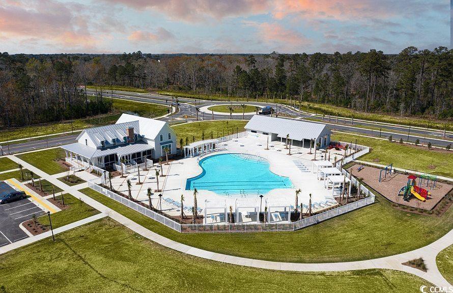 1524 Sayebrook Parkway Myrtle Beach, SC 29588 - Photo 39 of 40 Aerial view at dusk of view of pool area and a forest view