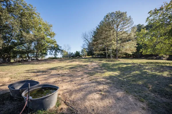a view of lake with green space