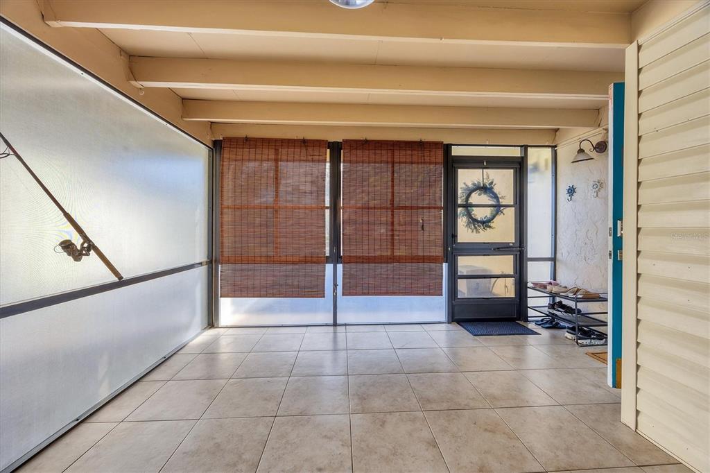 680 White Pine Tree Road, Unit 61 Venice, FL 34285 - Photo 14 of 40 a view of an empty room and window