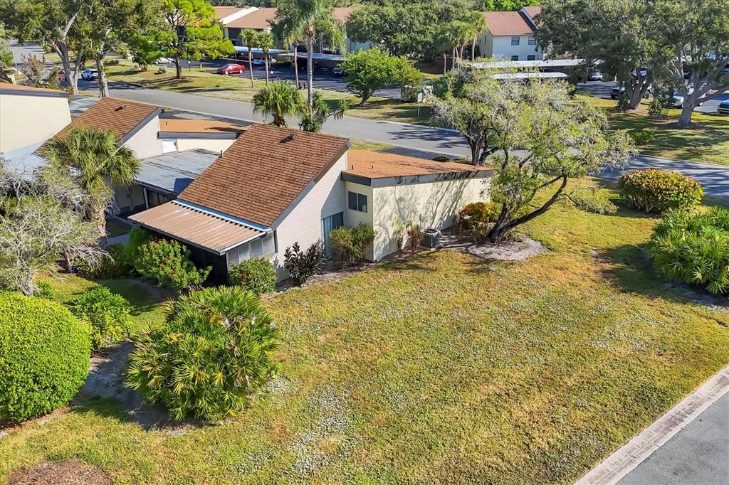 680 White Pine Tree Road, Unit 61 Venice, FL 34285 - Photo 23 of 40 a view of multiple houses with a yard