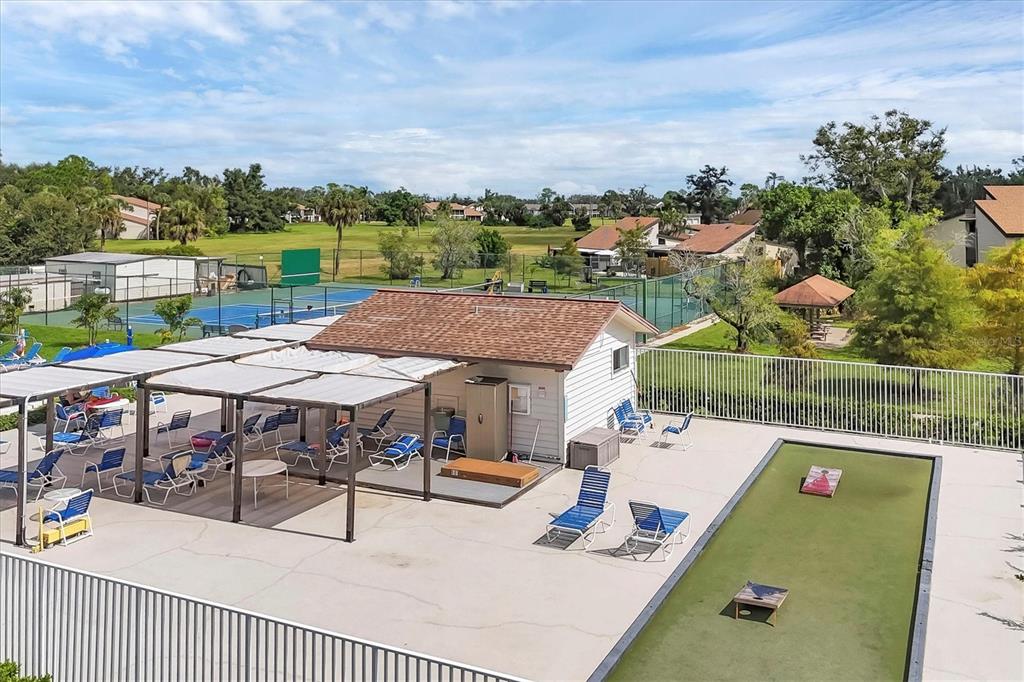 680 White Pine Tree Road, Unit 61 Venice, FL 34285 - Photo 34 of 40 a view of house with outdoor seating space