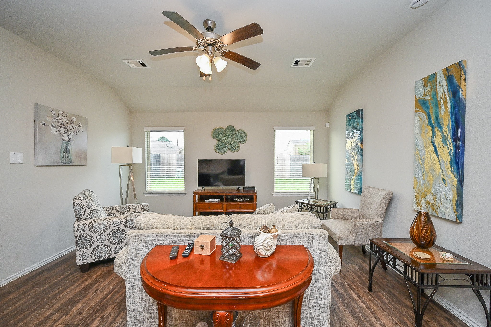 15418 Lost Lariat Court Channelview, TX 77530 - Photo 11 of 20 a living room with furniture and a flat screen tv