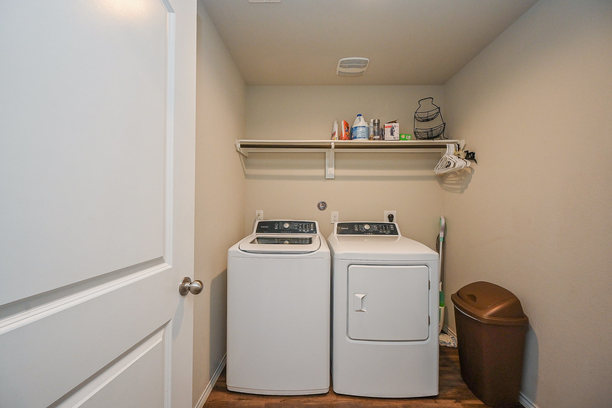 15418 Lost Lariat Court Channelview, TX 77530 - Photo 18 of 20 a utility room with dryer and washer