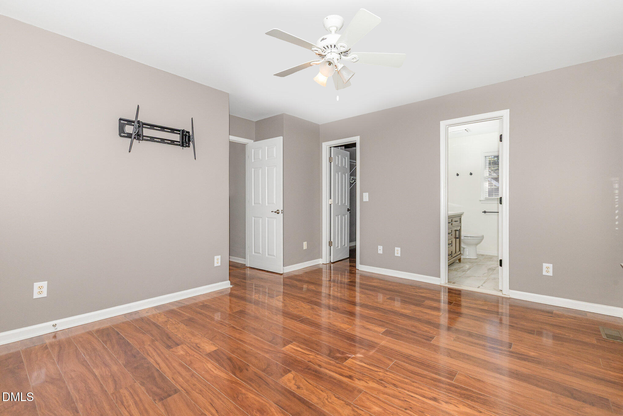 2813 Glastonbury Road Apex, NC 27539 - Photo 12 of 21 wooden floor in an empty room with a window