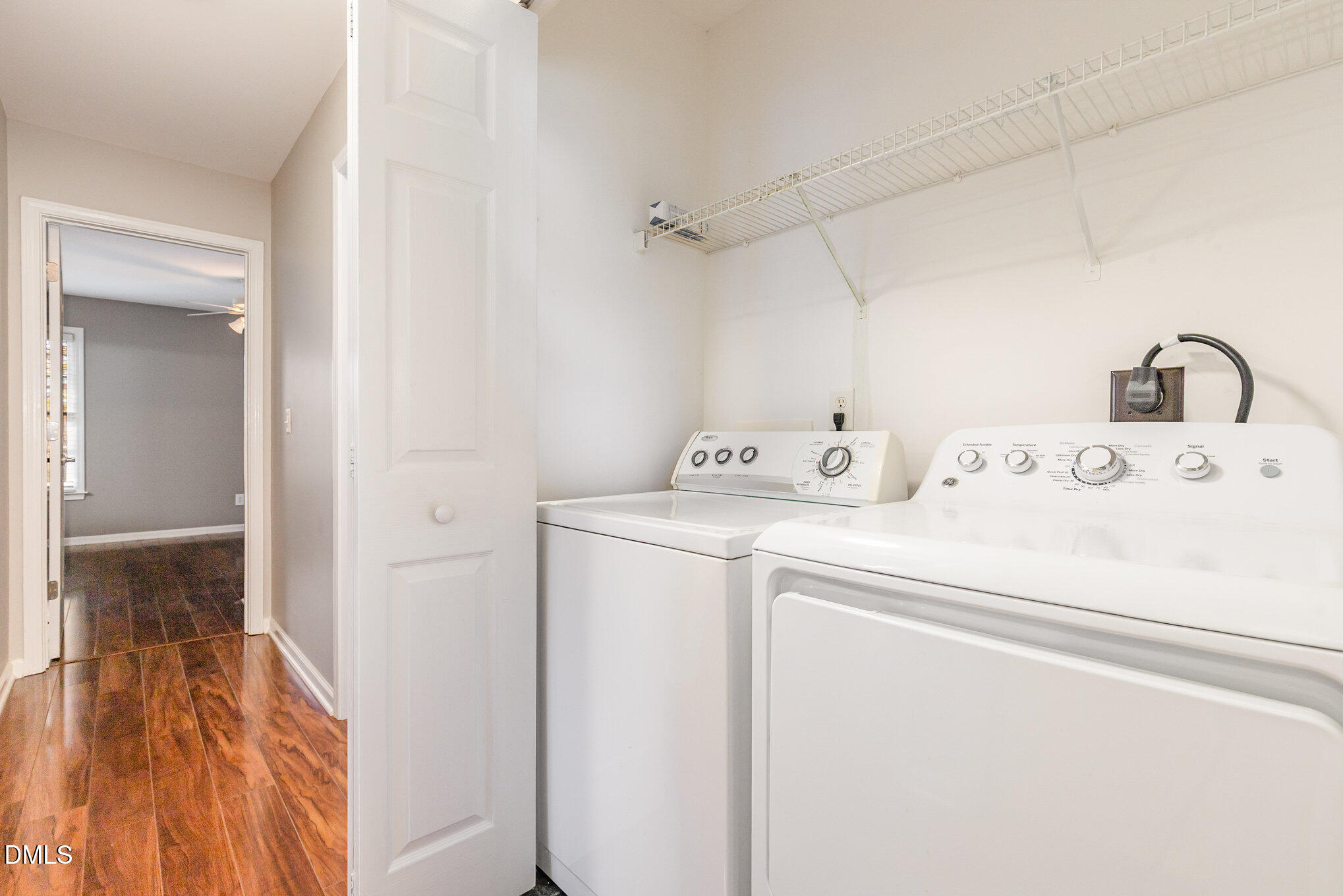 2813 Glastonbury Road Apex, NC 27539 - Photo 17 of 21 a utility room with dryer and washer