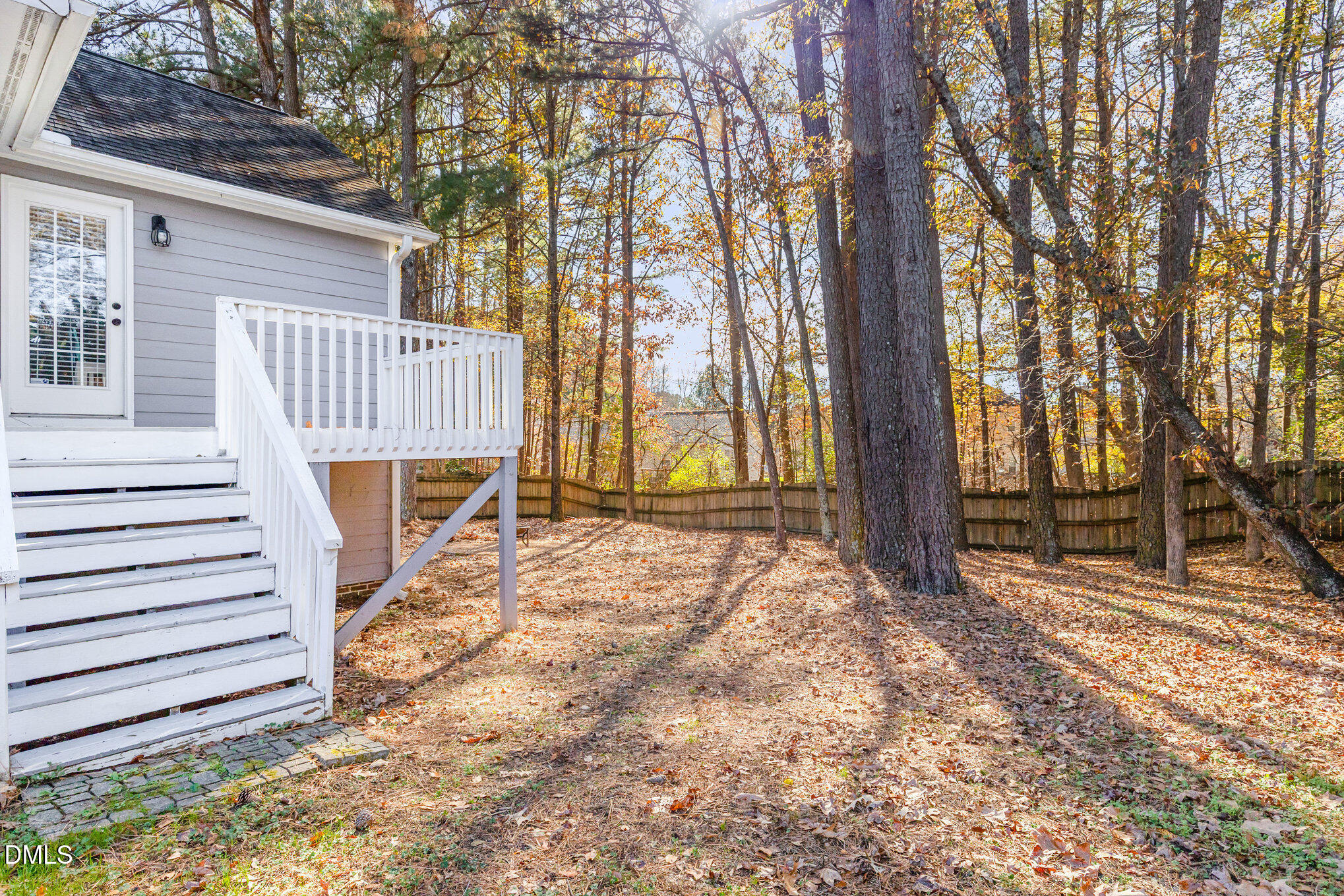 2813 Glastonbury Road Apex, NC 27539 - Photo 19 of 21 a house with trees in front of it