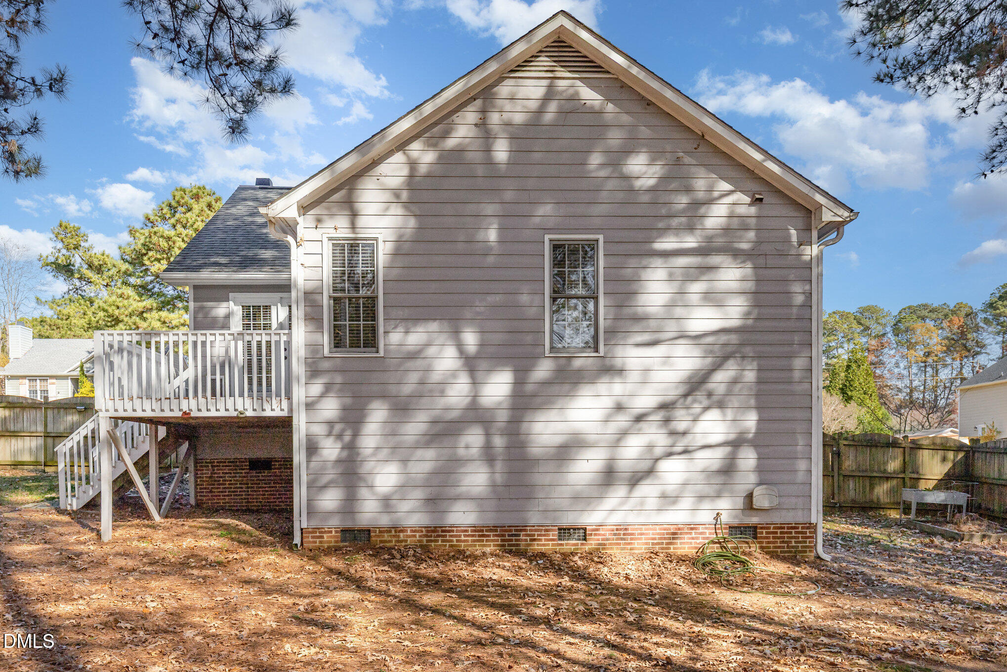 2813 Glastonbury Road Apex, NC 27539 - Photo 20 of 21 a backyard of a house