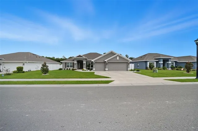a house view with a garden space