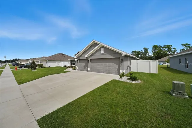 an empty room with windows and entrance