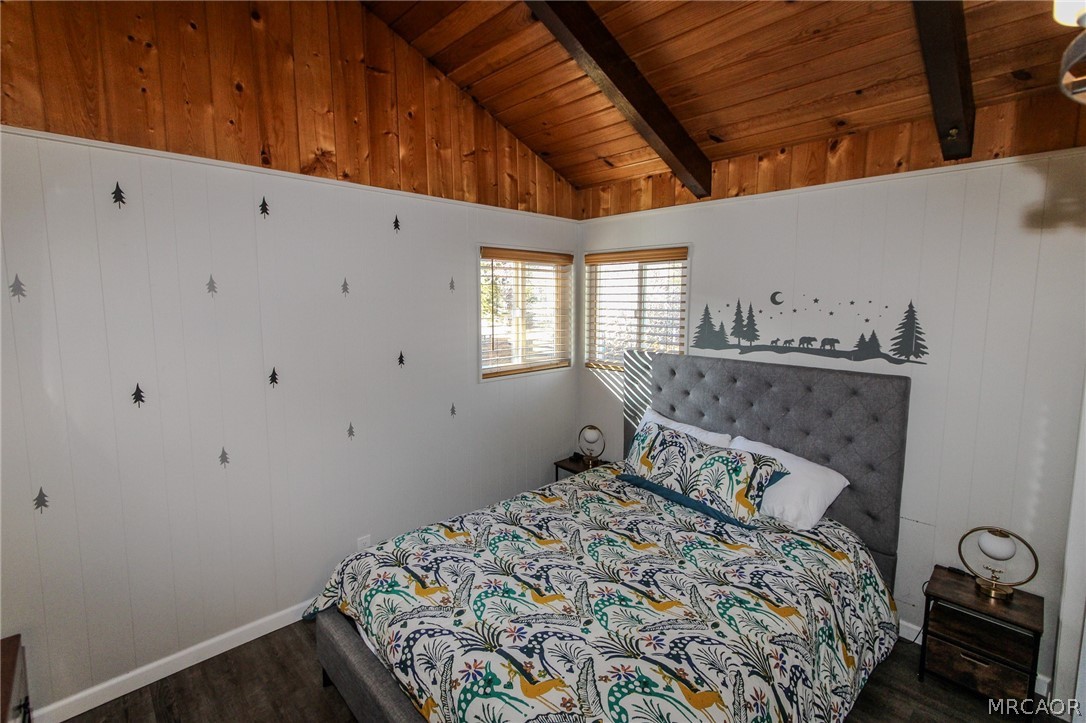 42830 Cougar Road, Unit UPPR Big Bear Lake, CA 92315 - Photo 13 of 21 a bedroom with a bed and a window