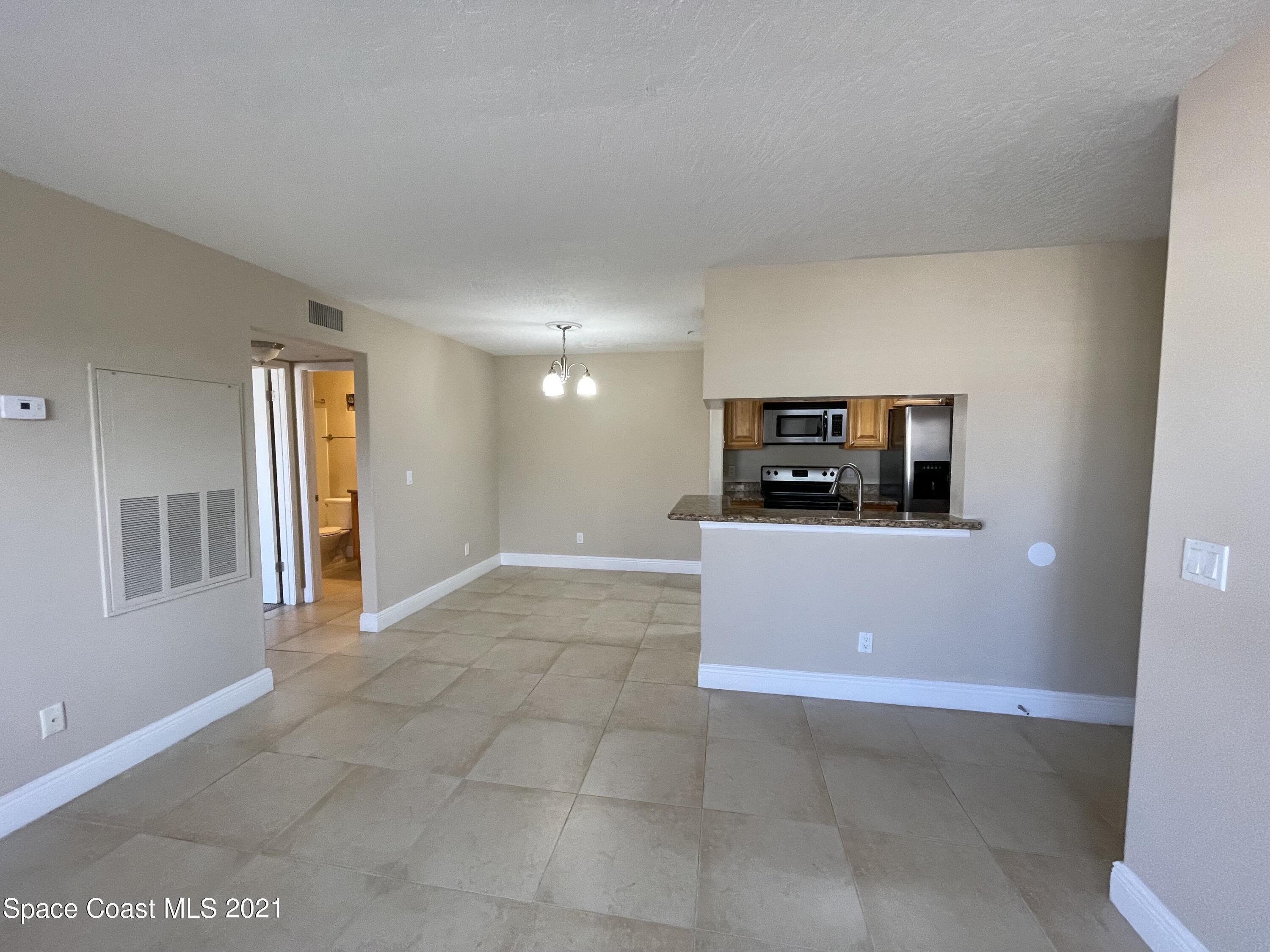 7667 North Wickham Road, Unit 416 Melbourne, FL 32940 - Photo 5 of 23 IMG_4782