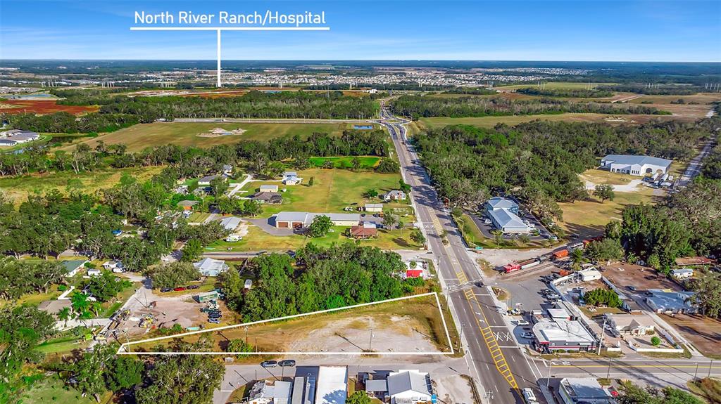 12346 Highway 301 Parrish, FL 34219 - Photo 4 of 8 a view of a city with an ocean view