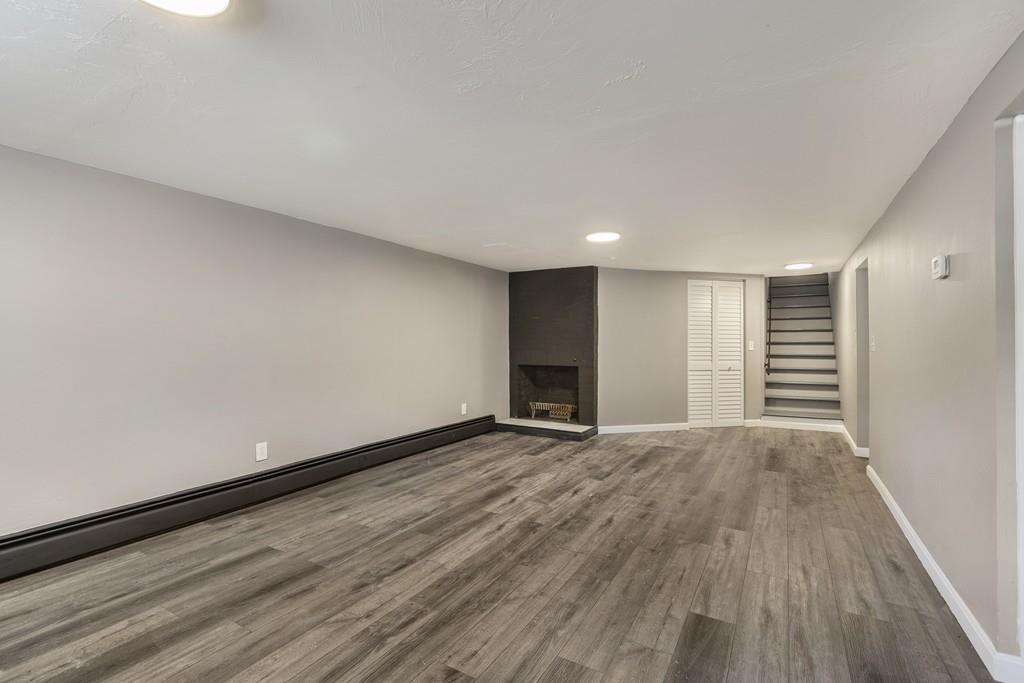 333 Berlin Road Marlborough, MA 01752 - Photo 13 of 32 a view of an empty room with wooden floor and a window