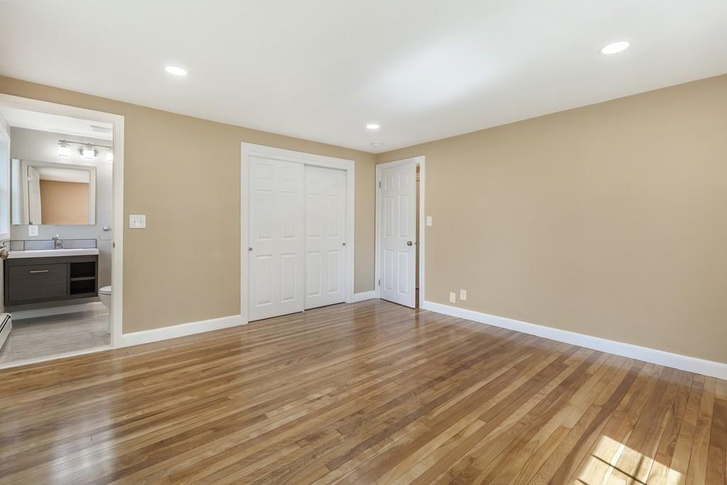 333 Berlin Road Marlborough, MA 01752 - Photo 15 of 32 wooden floor in an empty room with a window