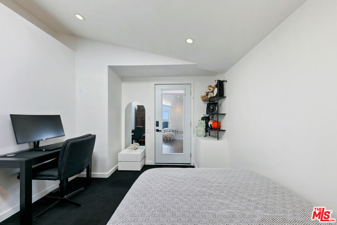 29500 Heathercliff Road, Unit 159 Malibu, CA 90265 - Photo 26 of 37 a living room with furniture and a flat screen tv