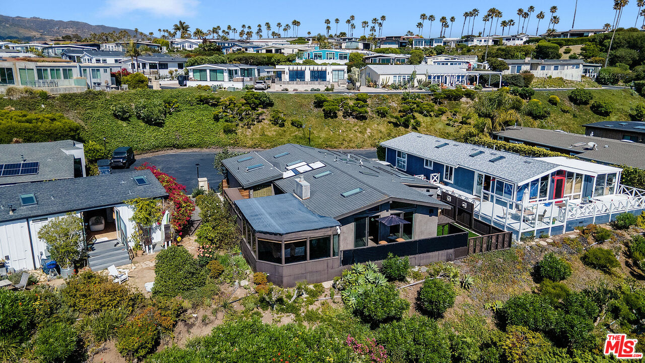 29500 Heathercliff Road, Unit 159 Malibu, CA 90265 - Photo 30 of 37 an aerial view of a house with a big yard