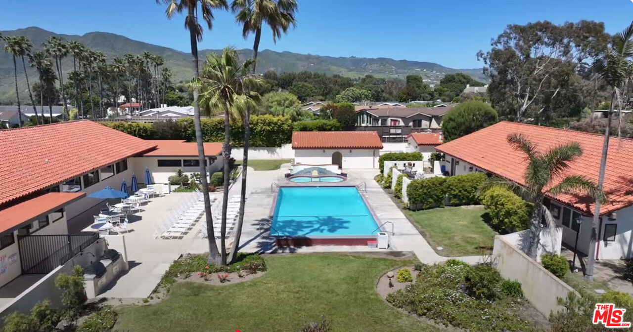 29500 Heathercliff Road, Unit 159 Malibu, CA 90265 - Photo 34 of 37 a view of a backyard with a patio