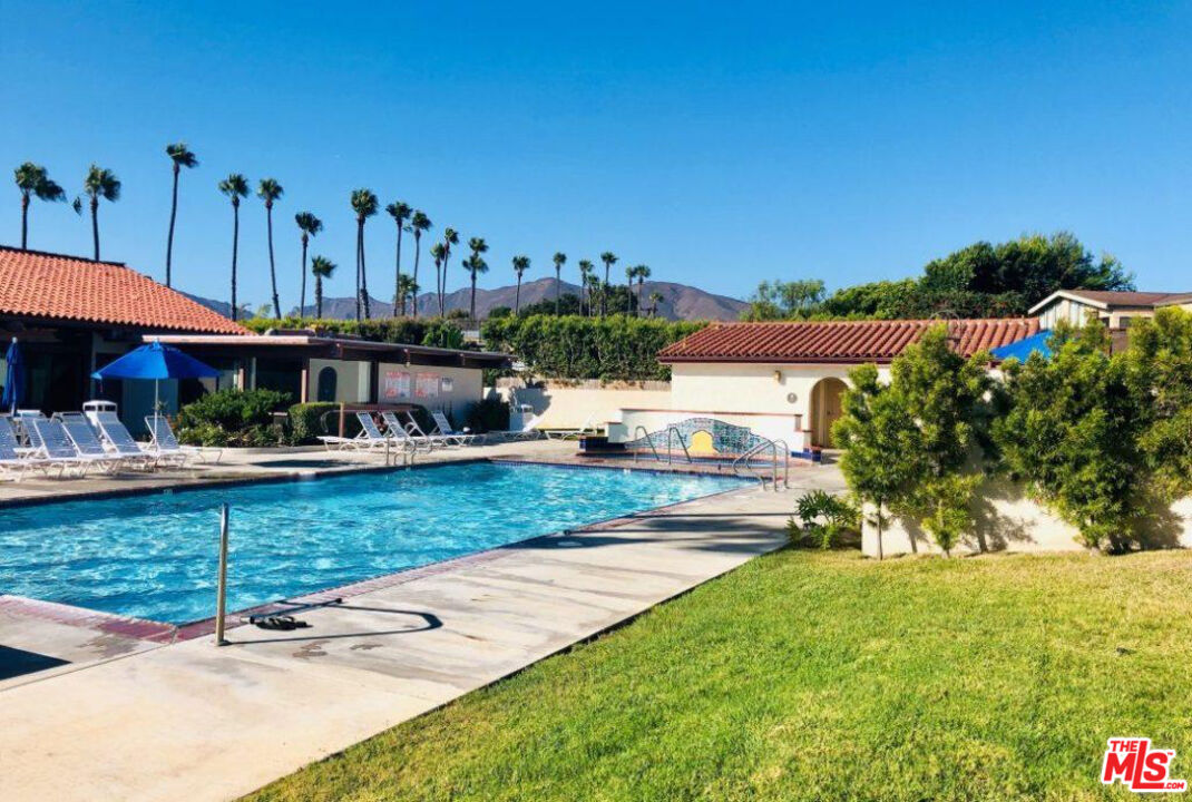 29500 Heathercliff Road, Unit 159 Malibu, CA 90265 - Photo 35 of 37 a view of a swimming pool with a patio